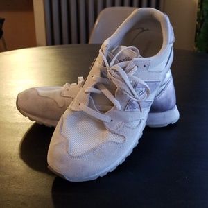 Tan and rose gold New Balance 520